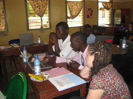 Sam helping workshop participants
