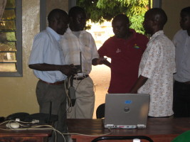 Staff trying to get the internet working during a power outage to contact the outreach program at CU